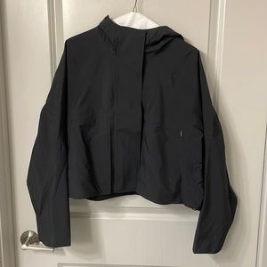 Black Lululemon rain jacket. Never worn!